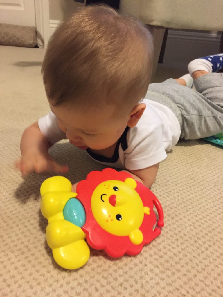Baby Owen's hair is fluffy and his scalp is free of cradle cap.